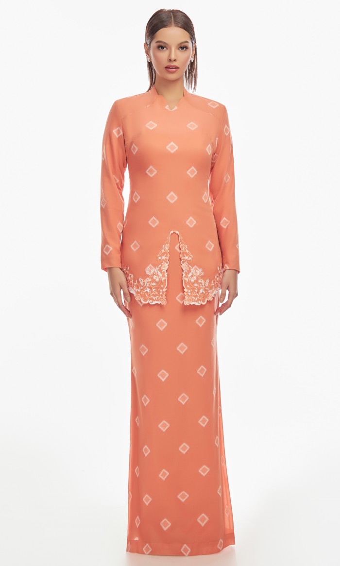 Greetha Kurung in Atomic Tangerine