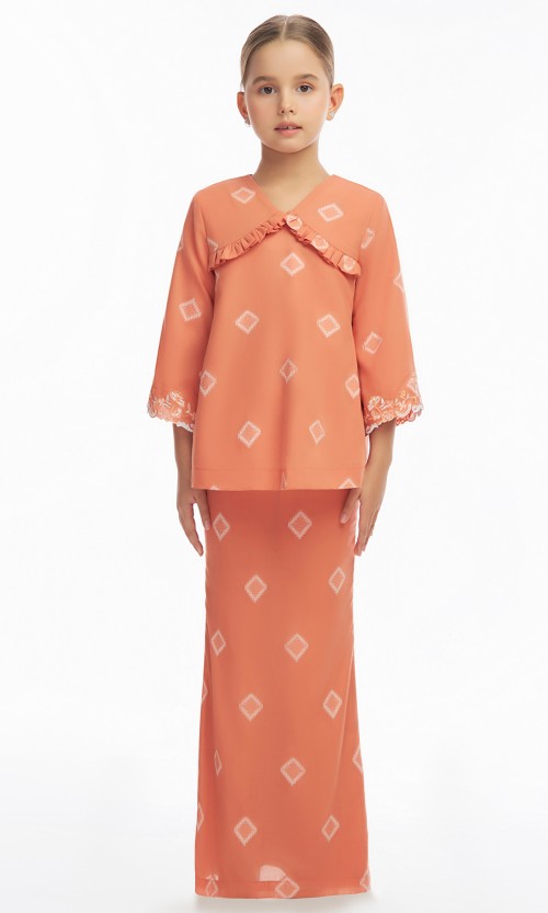 Greetha Kurung Kids in Atomic Tangerine